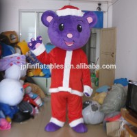 bear in Christmas theme red and purple color costume